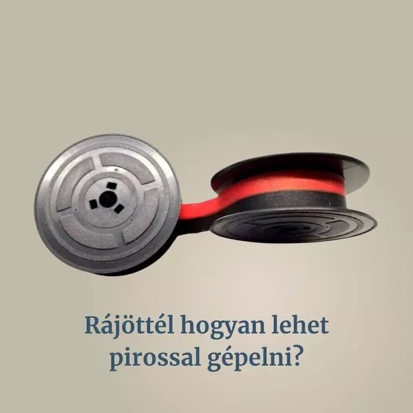 Klasszikus, piros-fekete írógépszalag egy retró írógépben. Gépelés a 80-as években.